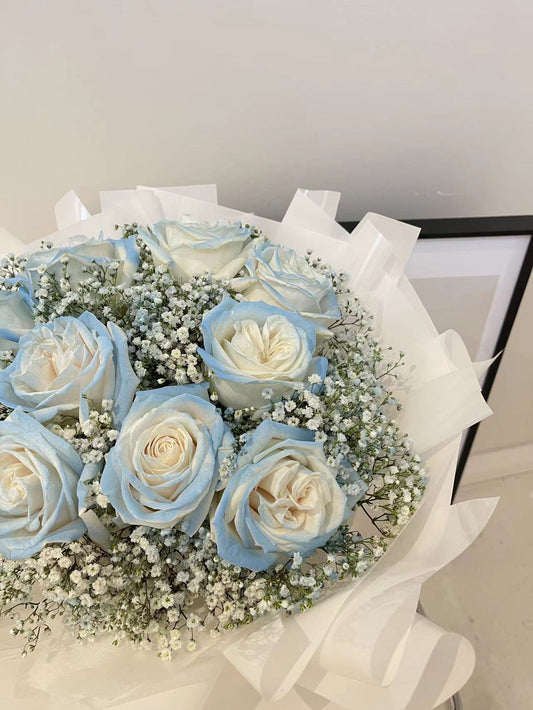 Icy blue rose bouquet